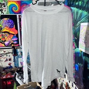 Woman’s medium Pink Long sleeve. Great condition very light material